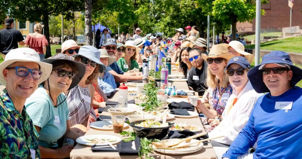 Picture of people at a longer table